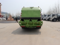 Camion compacteur de déchets à chargement arrière manuel FAW Jiefanghu VH 4x2 - 8-12 mètres cubes pour une collecte efficace des déchets municipaux