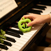 Séparateur de doigts en forme de pomme, entraîneur en silicone souple pour la rééducation de la main, la force des doigts et l'exercice pour enfants et adultes