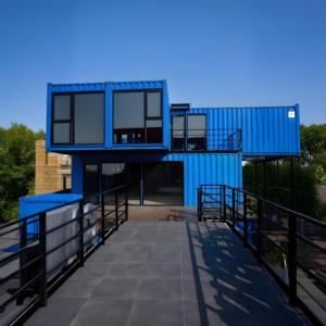 Trung tâm container đầy màu sắc hình học-Tòa nhà mô-đun Cắt nghệ thuật với thiết kế khối màu & cảnh ven biển - Product Image 4