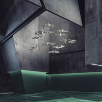 Moderne Kunst-Deko LED Pendelleuchte mit Einstellbarer Höhe, Ovaler Kronleuchter aus Glaskristall in Silber-Finish für Dimmbare Esstische und Hotels