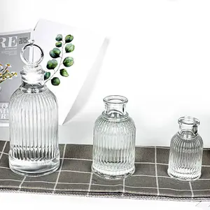 New Luxury Unique 50ml 100ml 200ml Roman Arab Engraving Glass Reed Diffuser Bottles with Cork