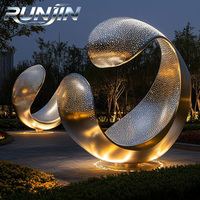 Sculpture d'art moderne en acier inoxydable soudé sur mesure, grande boucle infinie abstraite, creuse, avec éclairage LED, pour extérieur, place publique, parc