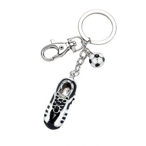 Portachiavi a Forma di Scarpa da Calcio Bianco e Nero in Pelle, Silicone, PVC Morbido e Metallo - Product Image 1