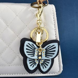 Llavero de mariposa de cuero PU al por mayor con temática de insectos para mujer, dijes para bolso - Product Image 3