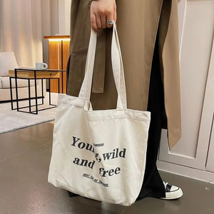 Grand sac fourre-tout oversize pour femmes le week-end Logo personnalisé en toile de coton noire avec motif de lettres à la mode - Product Image 1