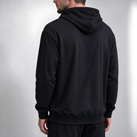 Sweat-shirt à capuche pour homme noir avec texte imprimé sur la poitrine, poche kangourou, cordon de serrage, manches longues, style minimaliste, OEM ODM Vente en gros