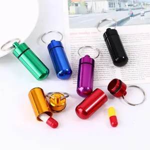 Kotak pil portabel kecil dengan gantungan kunci, wadah penyimpanan obat saku kotak Mini logam Organizer pil aluminium tahan air