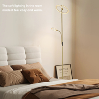 Lampadaire LED moderne de luxe doré avec base en métal style simple et abat-jour en tissu pour chambre à coucher ou salon d'hôtel