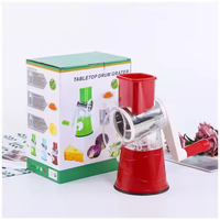 Hete Aanbieding Multifunctionele Keukenhulp, Voedselveilige Handmatige Fruit- en Groentesnijder, Kleurrijke Trommelhakselaar, Verpakt in Karton