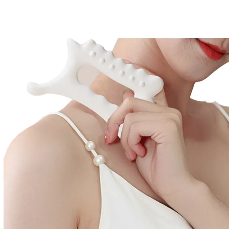 सफ़ेद आरामदायक एंटी-एजिंग त्वचा देखभाल उपकरण फेस बॉडी स्क्रैचर हैंडहेल्ड मसाजर गुआ शा बोर्ड