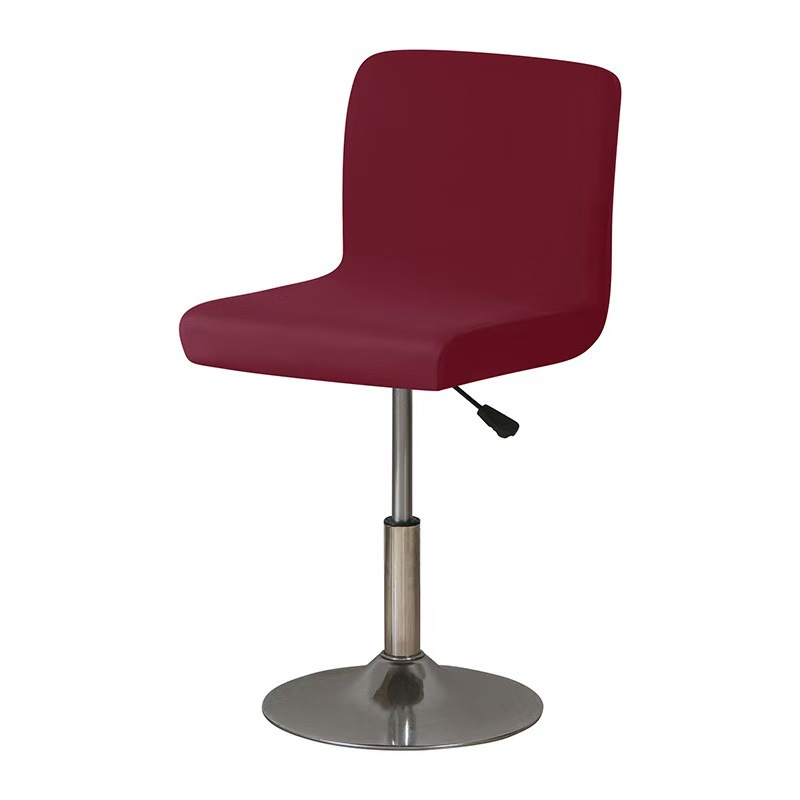 Chaise à dossier bas rouge vin, dossier ne dépassant pas 45 cm.
