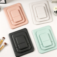 Miroir de maquillage compact en cuir PU disponible en OEM/ODM avec impression de logo laser pour les retouches beauté en voyage