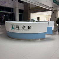 Bureau de réception rond moderne personnalisé en Corian avec éclairage LED et finition métallique pour postes d'infirmières d'hôpitaux et d'hôtels