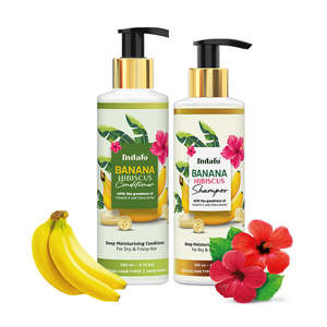 Champú y Acondicionador en Crema de Plátano e Hibisco de Alta Calidad, Anticaspa y Anticaída, Unisex, Hidratación Profunda para Cabello Seco y Encrespado - Product Image 1