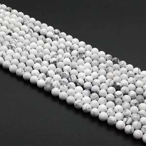 Chaîne de perles lisses en howlite blanche naturelle de 4 mm pour la création de bijoux, certifiées IGI, qualité AAA, faites à la main en Inde - Product Image 1