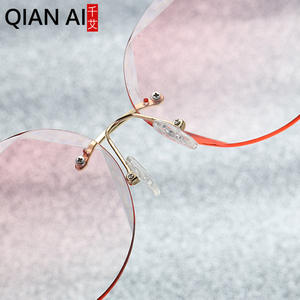 Gafas de sol de nuevo estilo con borde de corte poligonal para mujer, lentes degradados de metal sin marco dorado, UV400, ligeras, tipo 3 - Product Image 5