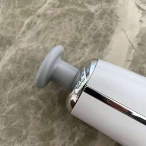 सफेद मालिश बंदूक कंपन मांसपेशी मालिश बंदूक थोक बिजली आवेग मालिश बंदूक - Product Image 5