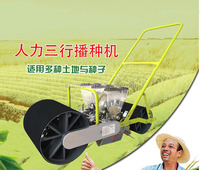 Semoir à pousser manuel semoir à oignon machine à planter les graines d'oignon ferme