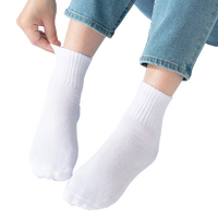 Chaussettes de compression en coton jetables OEM/ODM Chaussettes jetables unisexes pour les activités de plein air Voyage Hôtel Respirant Comprimé