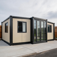 Maison conteneur pliable haut de gamme, isolée et résistante au vent, avec terrasse, toit à pignon et escalier