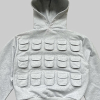 Sweat à capuche gris oversize premium, design multi-poches, coupe ample décontractée, streetwear fonctionnel unisexe
