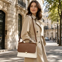 Sac à bandoulière mini en gros pour femme, sac à rabat carré bicolore pour un style décontracté quotidien et les voyages
