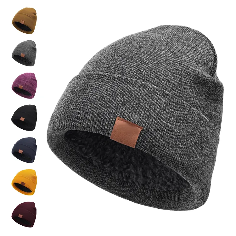 Venta al por mayor de sombreros unisex logotipo personalizado algodón orgánico lana Merino colorido al aire libre esquí invierno gorro de punto sombreros con parche de cuero