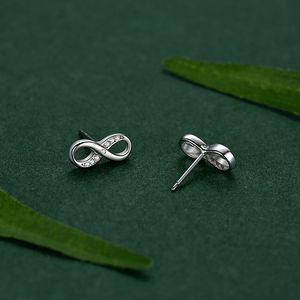 Pendientes de Plata de Ley S925 Minimalistas con Circonita Redonda y Símbolo de Eternidad, Versión en Cobre Personalizable - Exclusivo para Mujeres - Product Image 6