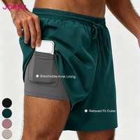 Celana Pendek Janya Comfort Quick Dry Breathable Lightweight Stretch Drawstring Loose Fit 2-in-1 dengan Lapisan Dalam dan Belahan Samping untuk Pria