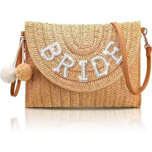 Bolsa de praia crossbody pequena e elegante com monograma Pom Poms de palha de ombro Designer