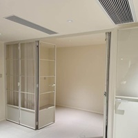 Porte pliante industrielle robuste en alliage d'aluminium à cadre ultra-étroit avec verre, haute résistance à l'humidité pour balcon et salon