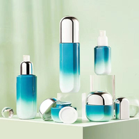 Nouveau kit de voyage pour pot de bouteille cosmétique en forme de cylindre supérieur doré bouteille cosmétique en plastique avec pompe à lotion sérigraphiée en soie
