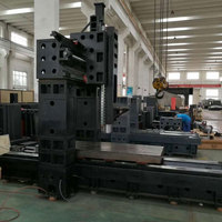 Centre d'usinage CNC à double colonne 3 axes pour métaux GMC2513 avec système Fanuc et changeur d'outils OKADA