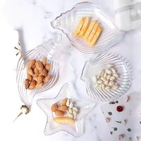 Assiettes en verre transparent de style classique en forme d'escargot de mer, d'étoile de mer et de coquille Saint-Jacques, avec bord doré, vente en gros d'usine, idéales pour offrir