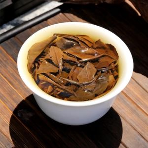 2023 parfum moelleux Puer Shu <span class=keywords><strong>Cha</strong></span> Yunnan <span class=keywords><strong>Qi</strong></span> <span class=keywords><strong>Zi</strong></span> <span class=keywords><strong>Bing</strong></span> gâteau de thé compressé en gros emballage de sachet de thé Pu'erh fermenté - Product Image 4