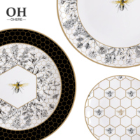 Nouvel arrivage Ensemble de vaisselle de mariage en porcelaine osseuse écologique de luxe Assiette de chargeur au design en nid d'abeille Assiette latérale Assiettes à vaisselle pour