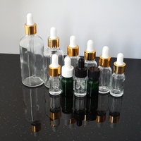 Flacon compte-gouttes en verre pour huile essentielle, cylindrique, 5 ml, 10 ml, 15 ml, 20 ml, 30 ml, 50 ml, 100 ml, avec verre transparent et bouchon doré