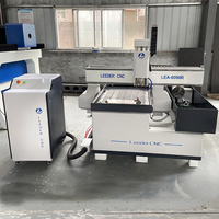 Petit stock chinois de pistolet à bois CNC 4 axes faisant la machine de gravure rotative 6090 6012 9015 à vendre