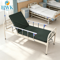 Lit médicalisé manuel à manivelle unique avec barrière latérale en alliage d'aluminium et tête de lit en fer pour usage en maison de retraite, clinique et soins à domicile