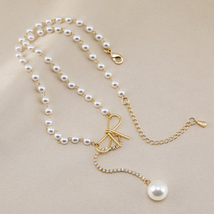 Collier de clavicule d'inspiration française vintage en zircon avec pendentif en perle plaqué rhodium, accessoires de conception de niche, vente en gros, 1 pièce - Product Image 5