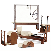 Ensemble d'équipements de Pilates en bois de noyer à cinq pièces avec Reformer Cadillac pour salle de sport commerciale