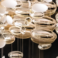 Lustre personnalisé pour hôtel, villa, escalier en colimaçon, galerie d'art, salle de banquet, projet d'éclairage suspendu