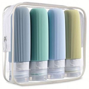 Ensemble de bouteilles de voyage 4 en 1 personnalisables avec logo, qualité alimentaire, rechargeables, bouteilles de toilette en silicone compressibles portables - Product Image 1