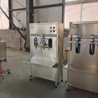 Machine de remplissage verticale automatique à double tête 1L 5L pour huile d'olive, miel, eau, bière, lait, thé en bouteilles plastiques et en verre