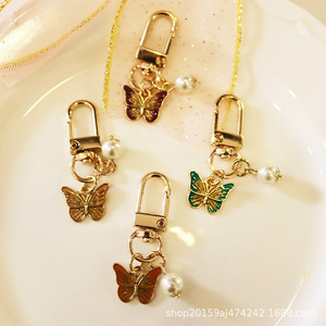 2020 Creative Alliage Papillon Perle Pendentif Sac Décoration Téléphone Cas De Voiture Porte-clés - Product Image 3