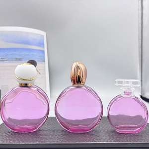 زجاجة عطر فاخرة مسطحة دائرية شفافة قابلة لإعادة الملء بسعة 30 مل و 50 مل و 100 مل - Product Image 5