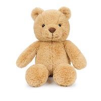 Ours en peluche avec des oreilles rondes, un nez brun et des pattes arrondies pour des présentations classiques d'ours en peluche