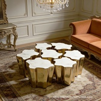 Table basse italienne haut de gamme, modulaire, de style design, légèrement luxueuse, multifonctionnelle, en acier inoxydable avec plateau en marbre pour salon