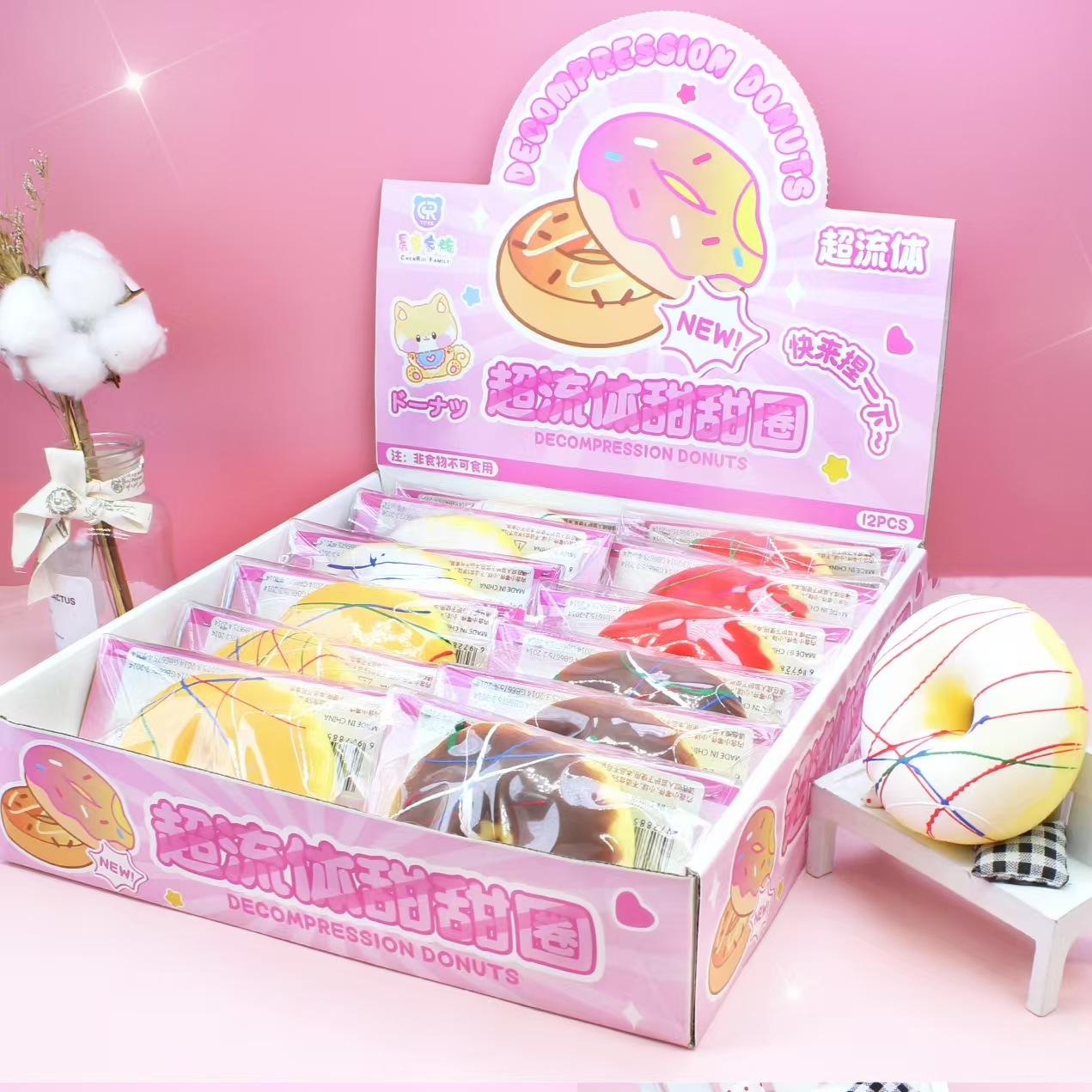 Bolsa individual grande tipo donut para fluidos con cabezal de tarjeta y caja expositora.