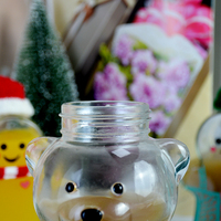 Gobelet à boisson en verre transparent de haute qualité en forme d'ours mignon avec un manchon, un couvercle et une paille